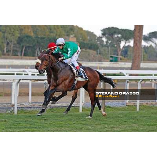 Antonio Fresu on Svatantra wins the Premio Federico Smith beating Carlo Fiocchi on Cleo Fan Rome - Capannelle racecourse,9th march 2014 ph.Domenico Savi/Grasso