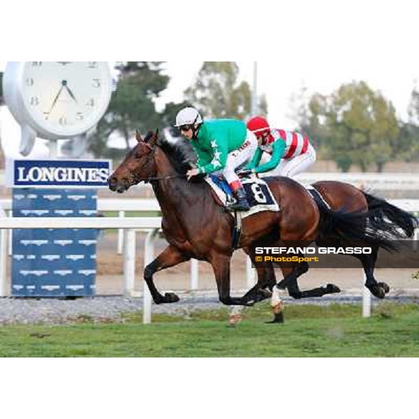 Antonio Fresu on Svatantra wins the Premio Federico Smith beating Carlo Fiocchi on Cleo Fan Rome - Capannelle racecourse,9th march 2014 ph.Domenico Savi/Grasso