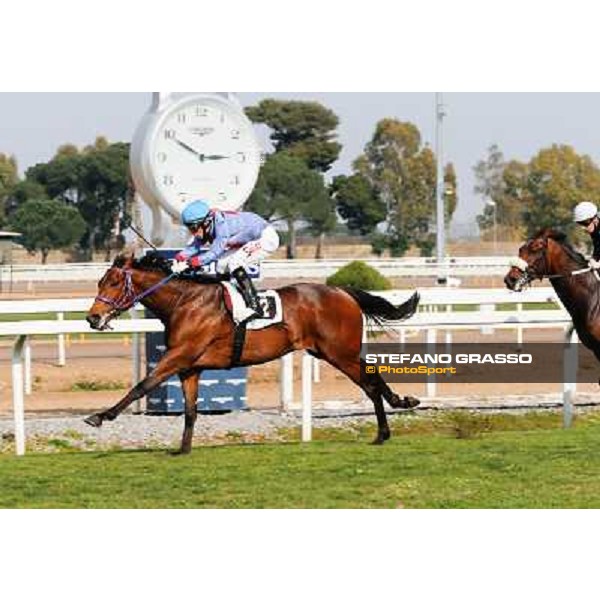 Salvatore Sulas on Hoovergetthekeys wins the Premio Arconte beating Cristian Demuro on Uniram Rome - Capannelle racecourse,16th march 2014 ph.Domenico Savi/Grasso