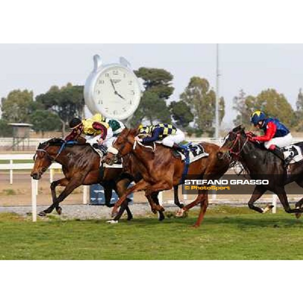 Giuseppe Ercecovig on Rayos de Sol wins the Premio Ceprano - 2nd Cristian Demuro on Sweet Fede Rome - Capannelle racecourse,16th march 2014 ph.Domenico Savi/Grasso