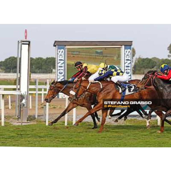 Giuseppe Ercecovig on Rayos de Sol wins the Premio Ceprano - 2nd Cristian Demuro on Sweet Fede Rome - Capannelle racecourse,16th march 2014 ph.Domenico Savi/Grasso