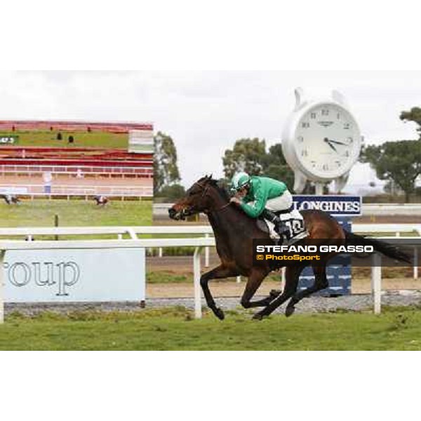 Francesco Dettori on Slowpoke wins the Premio Mezzegra Rome, Capannelle racecourse, 23rd march 2014 ph.Domenico Savi/Grasso