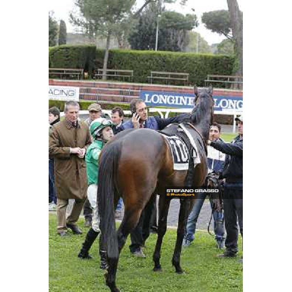 Francesco Dettori,Slowpoke,Luigi Riccardi and Giuseppe Rosati Colarieti after winning the Premio Mezzegra Rome, Capannelle racecourse, 23rd march 2014 ph.Domenico Savi/Grasso