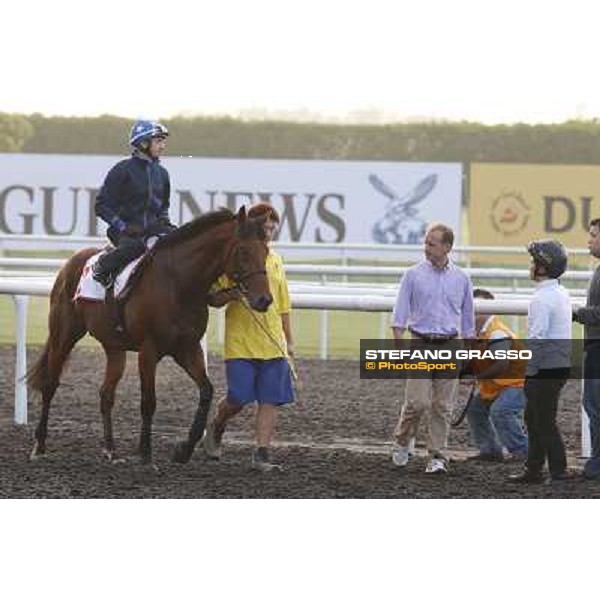 morning track works - Douglas White on Akeed Mofeed and Richard Gibson Dubai - Meydan racecourse,27th march 2014 ph.Stefano Grasso