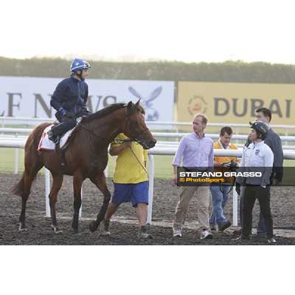 morning track works - Douglas White on Akeed Mofeed and Richard Gibson Dubai - Meydan racecourse,27th march 2014 ph.Stefano Grasso