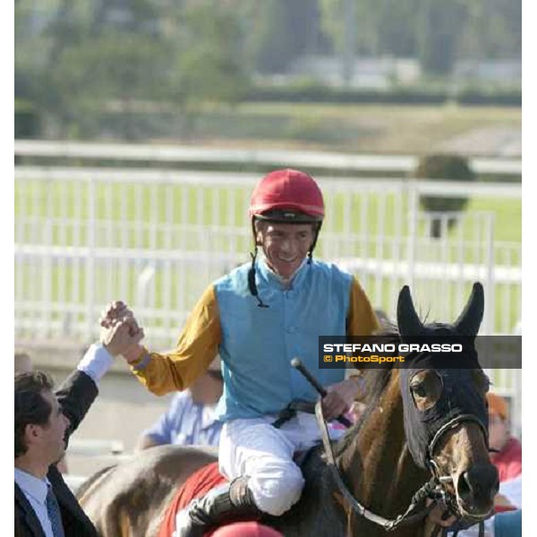 exulting Adrie De Vries on Gyreka enters in the winner enclosure after winning The Oaks d\'Italia San Siro, Milan 18th june 2005 ph. Stefano Grasso