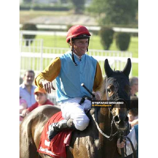 exulting Adrie De Vries on Gyreka enters in the winner enclosure after winning The Oaks d\'Italia San Siro, Milan 18th june 2005 ph. Stefano Grasso