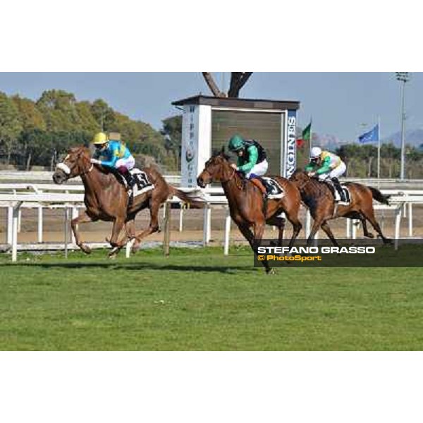 Umberto Rispoli on Scighera wins the Premio Bellni, 2nd is Vallecupa Rome, Capannelle racecourse,30th march 2014 ph.Daniele Incollu/Grasso