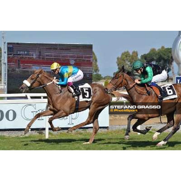 Umberto Rispoli on Scighera wins the Premio Bellni, 2nd is Vallecupa Rome, Capannelle racecourse,30th march 2014 ph.Daniele Incollu/Grasso