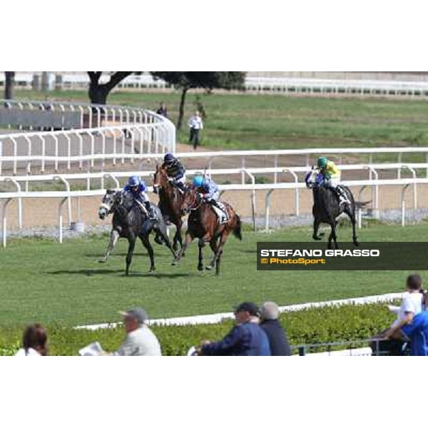 Cristian Demuro on Freedom Holder wins the Premio Daumier - Mem.Marco Rinaldi - 2nd is Salvatore Sulas on Hoovergetthekeys Roma - Capannelle racecourse,6th april 2014 ph.Stefano Grasso