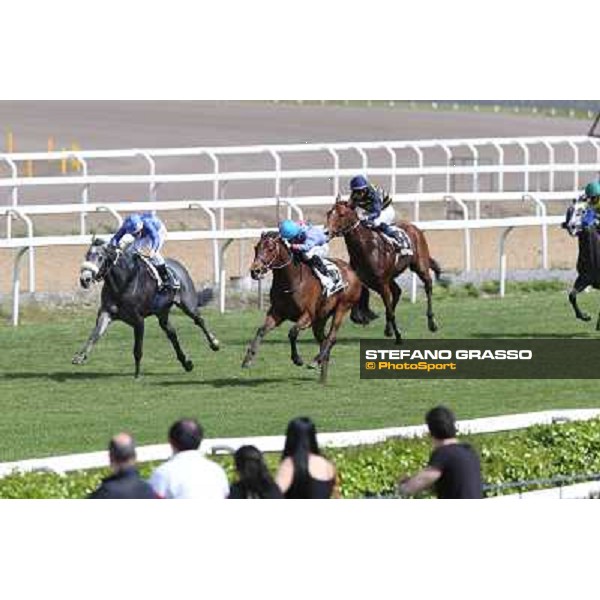 Cristian Demuro on Freedom Holder wins the Premio Daumier - Mem.Marco Rinaldi - 2nd is Salvatore Sulas on Hoovergetthekeys Roma - Capannelle racecourse,6th april 2014 ph.Stefano Grasso