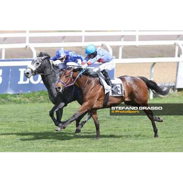 Cristian Demuro on Freedom Holder wins the Premio Daumier - Mem.Marco Rinaldi - 2nd is Salvatore Sulas on Hoovergetthekeys Roma - Capannelle racecourse,6th april 2014 ph.Stefano Grasso