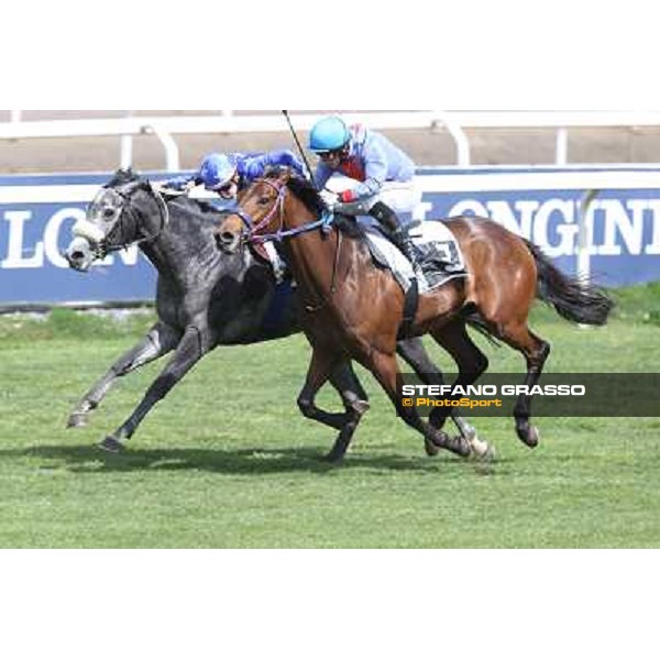 Cristian Demuro on Freedom Holder wins the Premio Daumier - Mem.Marco Rinaldi - 2nd is Salvatore Sulas on Hoovergetthekeys Roma - Capannelle racecourse,6th april 2014 ph.Stefano Grasso