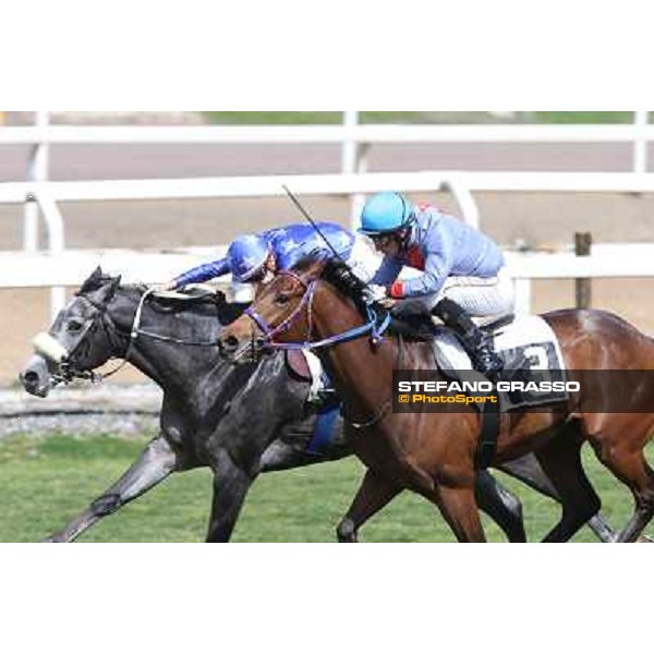Cristian Demuro on Freedom Holder wins the Premio Daumier - Mem.Marco Rinaldi - 2nd is Salvatore Sulas on Hoovergetthekeys Roma - Capannelle racecourse,6th april 2014 ph.Stefano Grasso