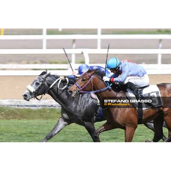 Cristian Demuro on Freedom Holder wins the Premio Daumier - Mem.Marco Rinaldi - 2nd is Salvatore Sulas on Hoovergetthekeys Roma - Capannelle racecourse,6th april 2014 ph.Stefano Grasso