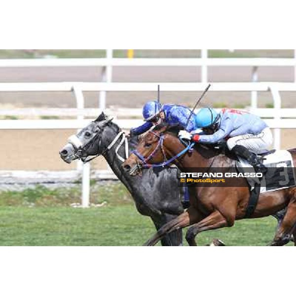 Cristian Demuro on Freedom Holder wins the Premio Daumier - Mem.Marco Rinaldi - 2nd is Salvatore Sulas on Hoovergetthekeys Roma - Capannelle racecourse,6th april 2014 ph.Stefano Grasso