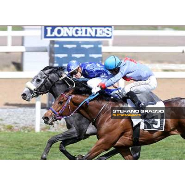 Cristian Demuro on Freedom Holder wins the Premio Daumier - Mem.Marco Rinaldi - 2nd is Salvatore Sulas on Hoovergetthekeys Roma - Capannelle racecourse,6th april 2014 ph.Stefano Grasso