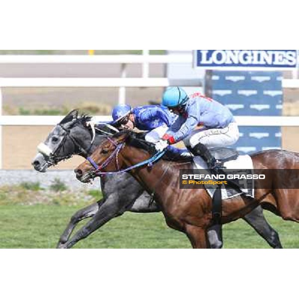 Cristian Demuro on Freedom Holder wins the Premio Daumier - Mem.Marco Rinaldi - 2nd is Salvatore Sulas on Hoovergetthekeys Roma - Capannelle racecourse,6th april 2014 ph.Stefano Grasso