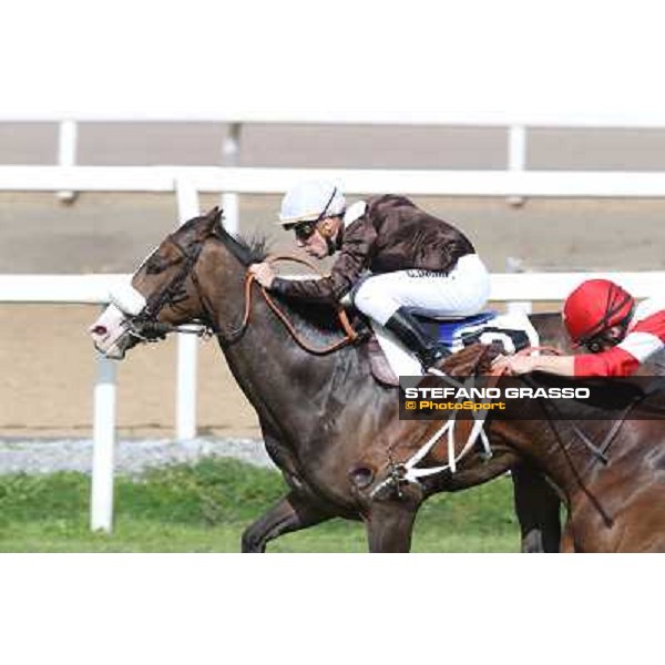 Cristian Demuro on Donna Prassede wins the Premio Torricola - 2nd is Gabriele Bietolini on Kitten\'s Lady Roma - Capannelle racecourse,6th april 2014 ph.Stefano Grasso