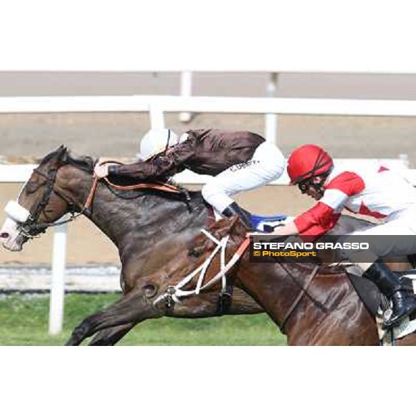 Cristian Demuro on Donna Prassede wins the Premio Torricola - 2nd is Gabriele Bietolini on Kitten\'s Lady Roma - Capannelle racecourse,6th april 2014 ph.Stefano Grasso