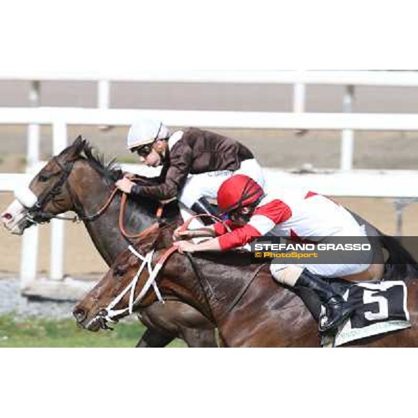 Cristian Demuro on Donna Prassede wins the Premio Torricola - 2nd is Gabriele Bietolini on Kitten\'s Lady Roma - Capannelle racecourse,6th april 2014 ph.Stefano Grasso