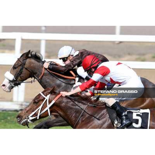 Cristian Demuro on Donna Prassede wins the Premio Torricola - 2nd is Gabriele Bietolini on Kitten\'s Lady Roma - Capannelle racecourse,6th april 2014 ph.Stefano Grasso