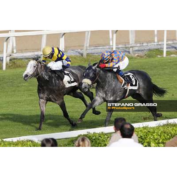 Samuele Diana on Adsense wins the Premio Cloridano - 2nd is Fois on Jolly of Naytiri Roma - Capannelle racecourse,6th april 2014 ph.Domenico Savi/Grasso