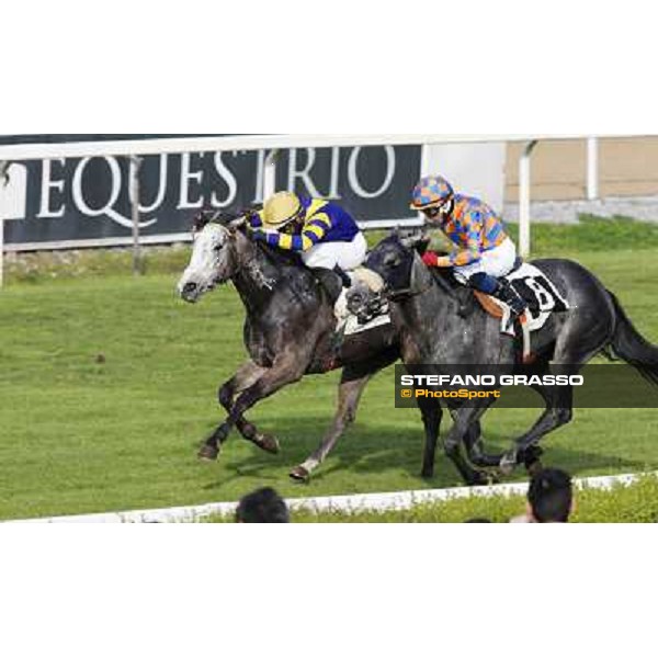 Samuele Diana on Adsense wins the Premio Cloridano - 2nd is Fois on Jolly of Naytiri Roma - Capannelle racecourse,6th april 2014 ph.Domenico Savi/Grasso