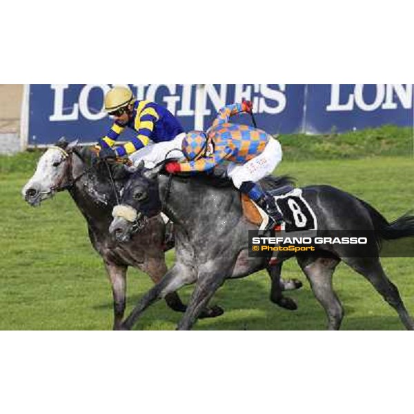 Samuele Diana on Adsense wins the Premio Cloridano - 2nd is Fois on Jolly of Naytiri Roma - Capannelle racecourse,6th april 2014 ph.Domenico Savi/Grasso