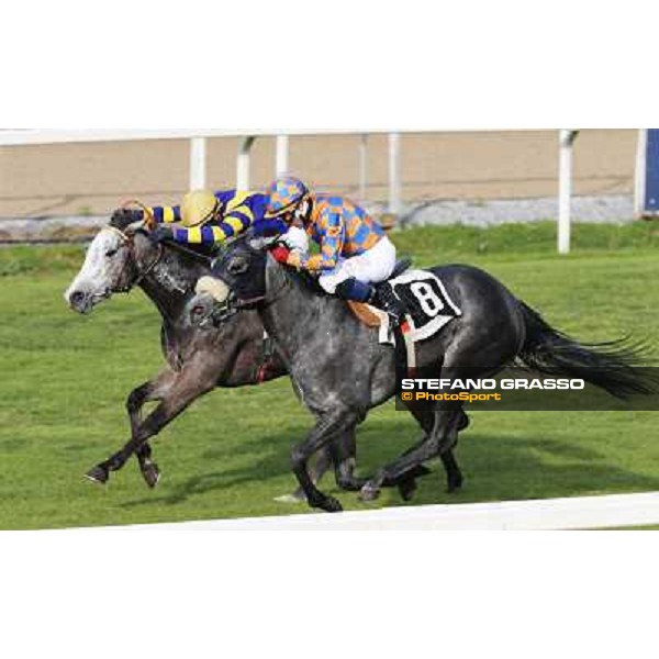 Samuele Diana on Adsense wins the Premio Cloridano - 2nd is Fois on Jolly of Naytiri Roma - Capannelle racecourse,6th april 2014 ph.Domenico Savi/Grasso