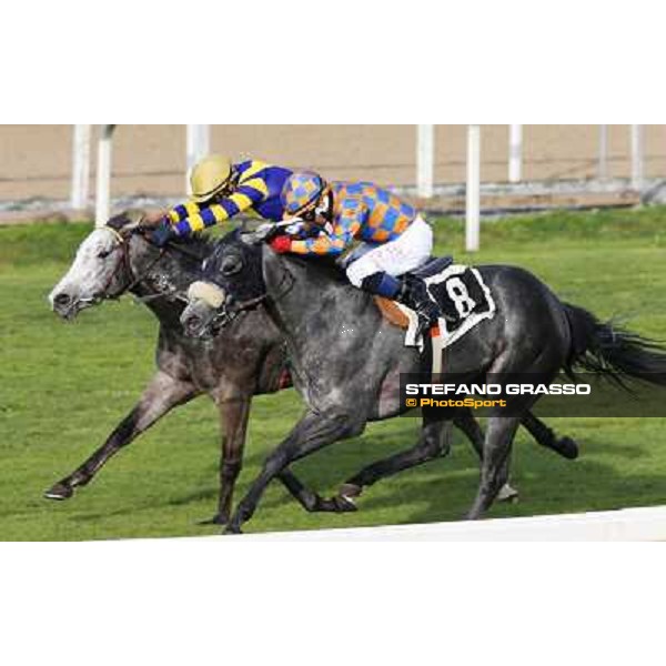 Samuele Diana on Adsense wins the Premio Cloridano - 2nd is Fois on Jolly of Naytiri Roma - Capannelle racecourse,6th april 2014 ph.Domenico Savi/Grasso