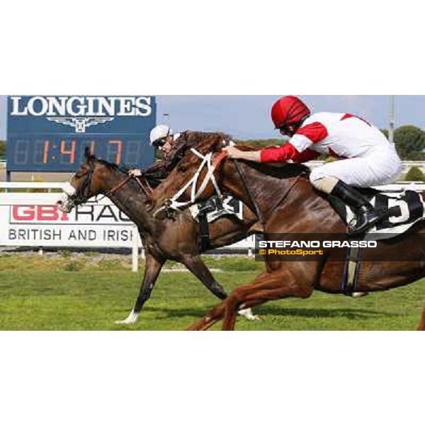 Cristian Demuro on Donna Prassede wins the Premio Torricola - 2nd is Gabriele Bietolini on Kitten\'s Lady Roma - Capannelle racecourse,6th april 2014 ph.Domenico Savi/Grasso