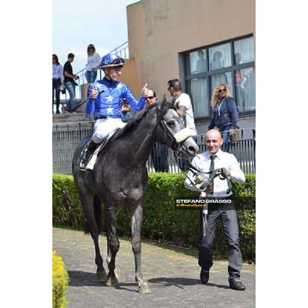Cristian Demuro on Freedom Holder returns home after winning the Premio Daumier Roma, Capannelle racecourse,6th april 2014 ph.Daniele Incollu/Grasso