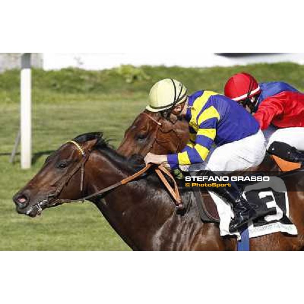 Dario Vargiu on Elettrotreno wins the Premio Le Moss beating Mirco Demuro on Le Vie Infinite Roma - Capannelle racecourse,11th april 2014 ph.Domenico Savi/Grasso