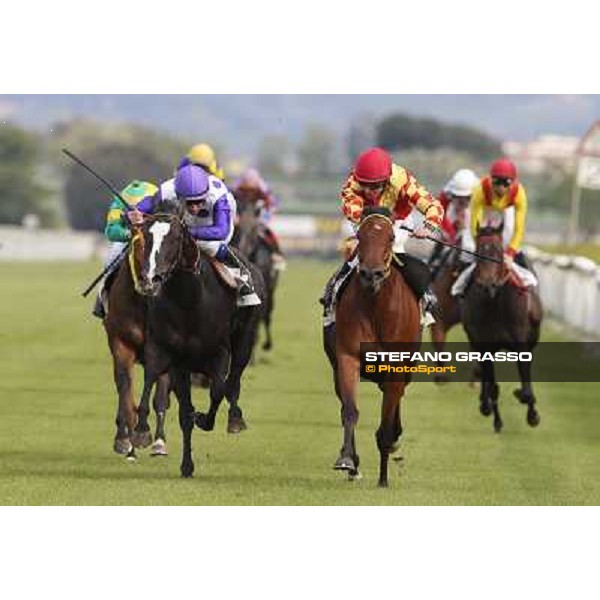 Luca Maniezzi on Clorofilla wins the Premio Carlo Chiesa. 2nd is Mario Esposito on Universo Star Rome, Capannelle racecourse 13th april 2014 ph.Stefano Grasso