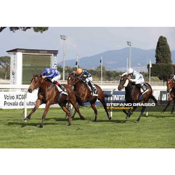 Dario Vargiu on Regarde Moi wins the Premio Natale di Roma - 2nd is Gabriele Bietolini on Saint Bernard Rome, Capannelle racecourse 13th april 2014 ph.Stefano Grasso