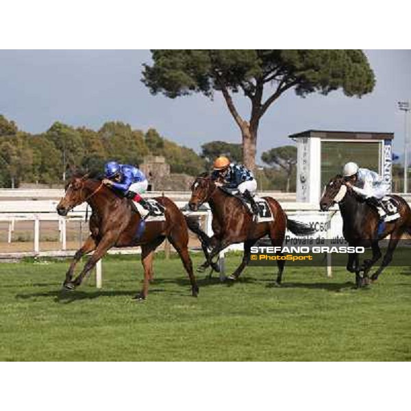 Dario Vargiu on Regarde Moi wins the Premio Natale di Roma - 2nd is Gabriele Bietolini on Saint Bernard Rome, Capannelle racecourse 13th april 2014 ph.Stefano Grasso