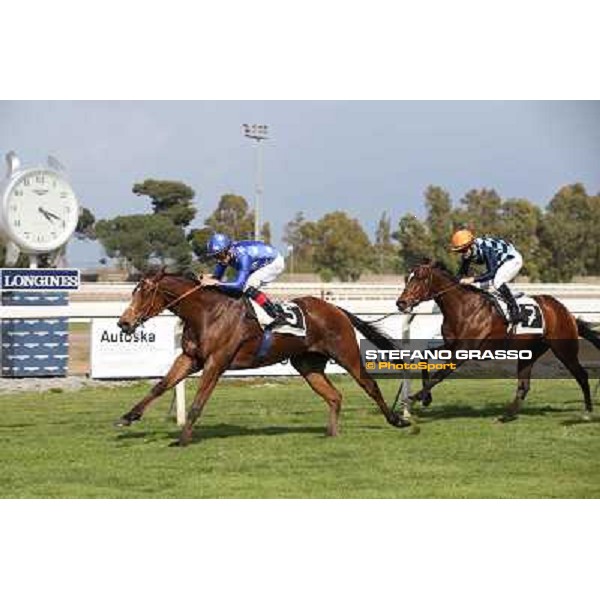 Dario Vargiu on Regarde Moi wins the Premio Natale di Roma - 2nd is Gabriele Bietolini on Saint Bernard Rome, Capannelle racecourse 13th april 2014 ph.Stefano Grasso