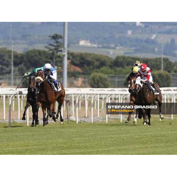 Carlo Fiocchi on Valvibrata wins the Premio Mario Perretti Mujahid Stakes Rome, Capannelle racecourse,11th may 2014 photo Stefano Grasso