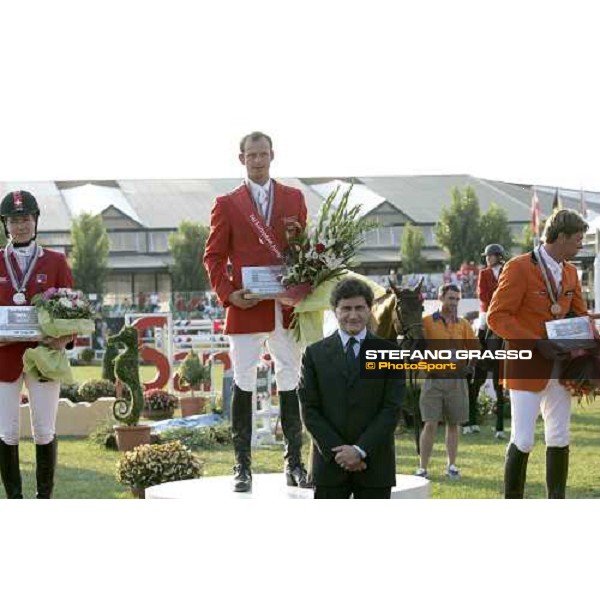 The podium of Fei European Championship San Patrignano 2005- Marco Kutscher, 1st - Christina Liebherr, 2nd - Jeroen Dubbeldam, 3rd and Minister on. Gianni Alemanno San Patrignano 24th july 2005 ph. Stefano Grasso