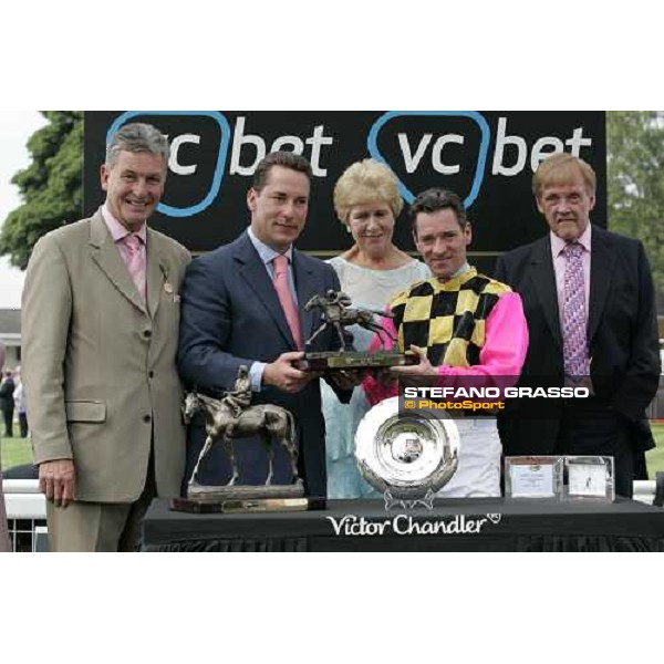 giving prize of the VC Bet Nunthorpe Stakes -jockey Michaels Hills and the owners Mrs. and Mr. Reed York, The Ebor Festival 18th august 2005 ph. Stefano Grasso