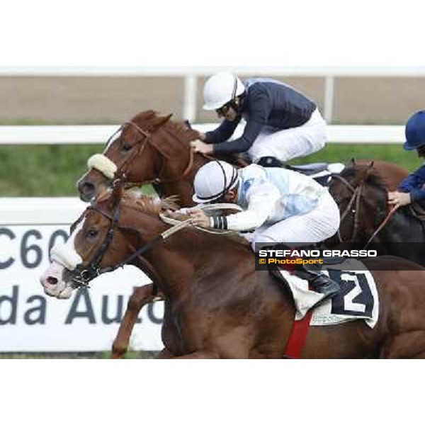 Dario Vargiu on Misterious Boy goes to win the Premio Guido Berardelli.Panther Cat is second Roma.Capannelle racecourse 26th october 2014 ph.Stefano Grasso