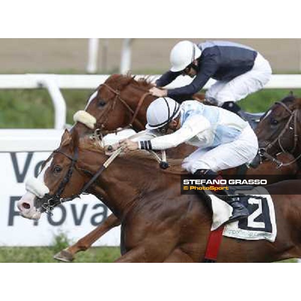 Dario Vargiu on Misterious Boy goes to win the Premio Guido Berardelli.Panther Cat is second Roma.Capannelle racecourse 26th october 2014 ph.Stefano Grasso