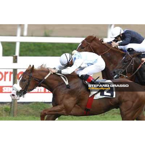 Dario Vargiu on Misterious Boy goes to win the Premio Guido Berardelli.Panther Cat is second Roma.Capannelle racecourse 26th october 2014 ph.Stefano Grasso