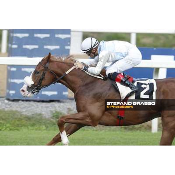 Dario Vargiu on Misterious Boy goes to win the Premio Guido Berardelli.Panther Cat is second Roma.Capannelle racecourse 26th october 2014 ph.Stefano Grasso