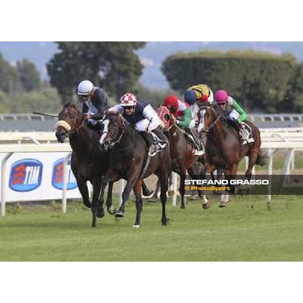 Olivier Peslier on Cape Magic wins the Premio Conte Felice Scheibler. Dario Vargiu on Uniram is second Roma.Capannelle racecourse 26th october 2014 ph.Domenico Savi/Grasso