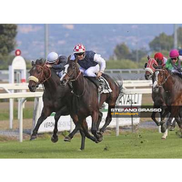 Olivier Peslier on Cape Magic wins the Premio Conte Felice Scheibler. Dario Vargiu on Uniram is second Roma.Capannelle racecourse 26th october 2014 ph.Domenico Savi/Grasso