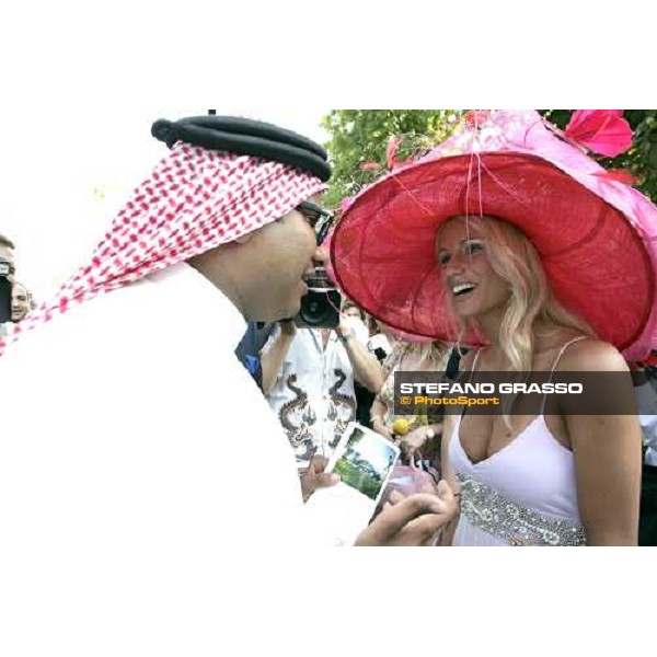 Michelle Hunziker speaking with Matar Bin Jarsh Al Falasi of Dubai Iffezheim Baden Baden 4th september 2005 ph. Stefano Grasso