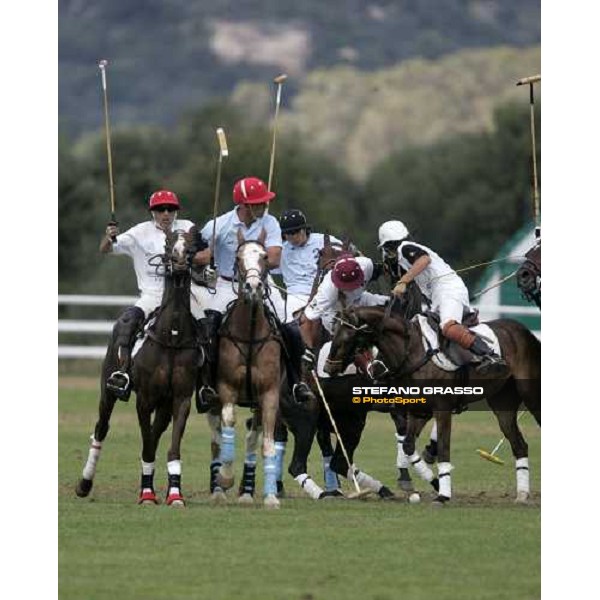 Tom Barrack (red cap) 2nd from left during the match Jaeger-LeCoultre Polo team vs. Hotel Cala di Volpe polo team Porto Cervo, 29th april 2006 ph. Stefano Grasso