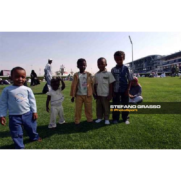 children on the field at Dubai World Cup Nad Al Sheba 28th march 2004 ph. Stefano Grasso